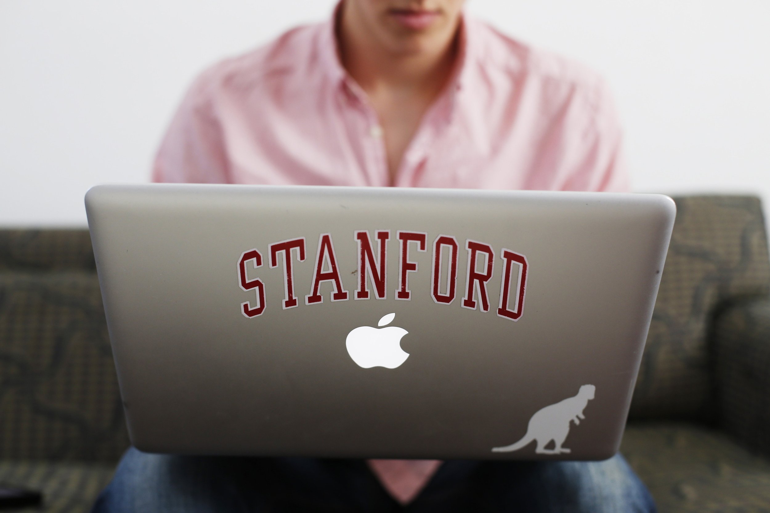 Chris Barber, a student at Stanford University, uses a laptop computer in his dorm room in June. The Free Application for Federal Student Aid (FAFSA) became available online Thursday morning.