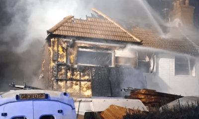 Car destroyed and huge hole left in roof after London house fire | News UK