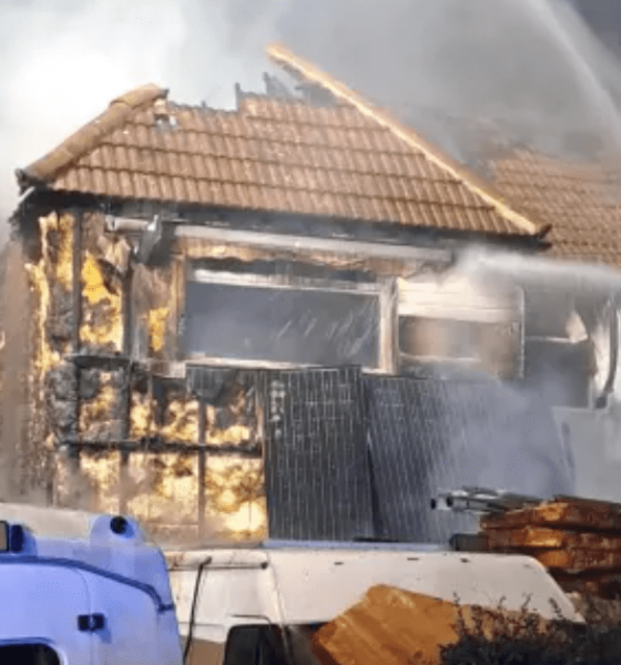Car destroyed and huge hole left in roof after London house fire | News UK