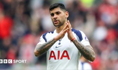 Cristian Romero applauds while playing for Tottenham