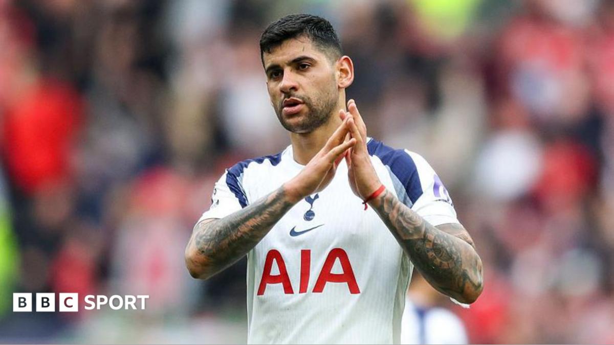 Cristian Romero applauds while playing for Tottenham