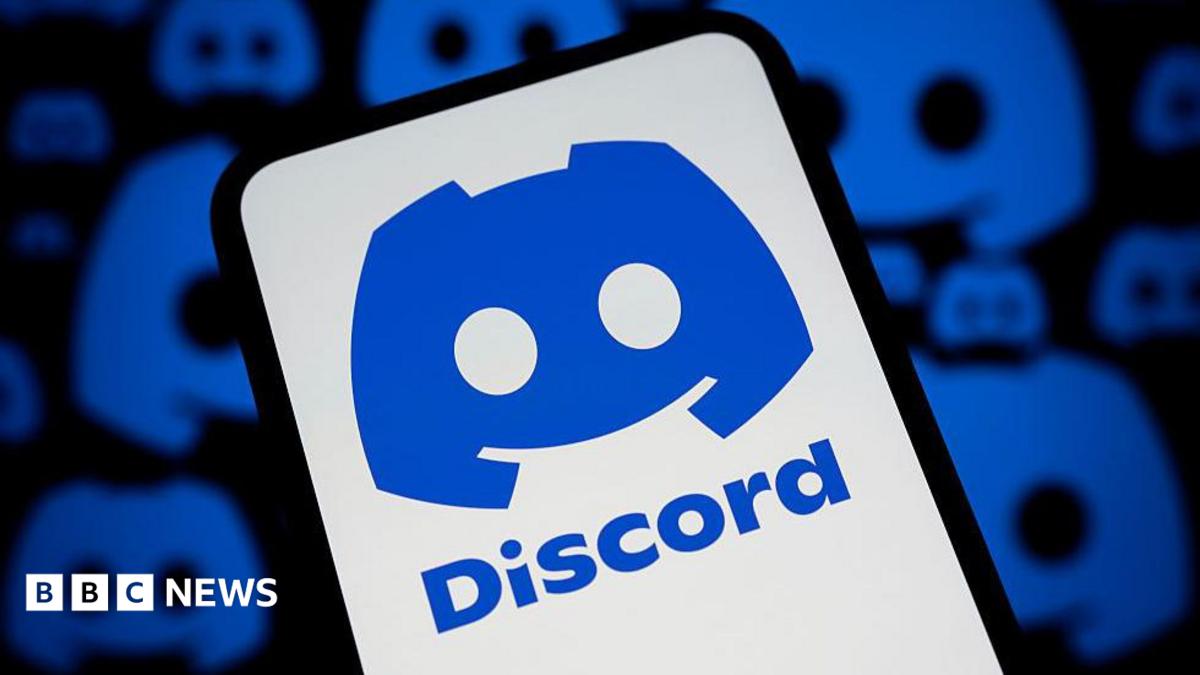 The blue Discord logo on a phone against a white background. In the background are more Discord logos on a black background.