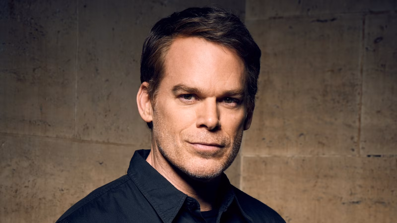 Michael C. Hall as Dexter Morgan in a promo shot looking straight into the camera for Dexter: Resurrection