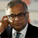N Chandrasekaran, wearing a dark suit, white shirt and thick-rimmed glasses, touches his ear in this photo taken at the Bombay Stock Exchange in Mumbai, India, on November 12, 2025.