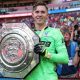 Crystal Palace keeper Dean Henderson holds up the Community Shield after his side's penalty shootout win over Liverpool