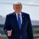 U.S. President Donald Trump gives thumbs-up as he walks from Marine One to board Air Force One.