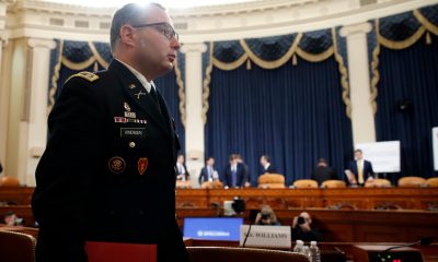 FILE - National Security Council aide Lt. Col. Alexander Vindman departs after testifying before the House Intelligence Committee on Capitol Hill in Washington, Nov. 19, 2019, during a public impeachment hearing of President Donald Trump's efforts to tie U.S. aid for Ukraine to investigations of his political opponents. (AP Photo/Alex Brandon, File)
