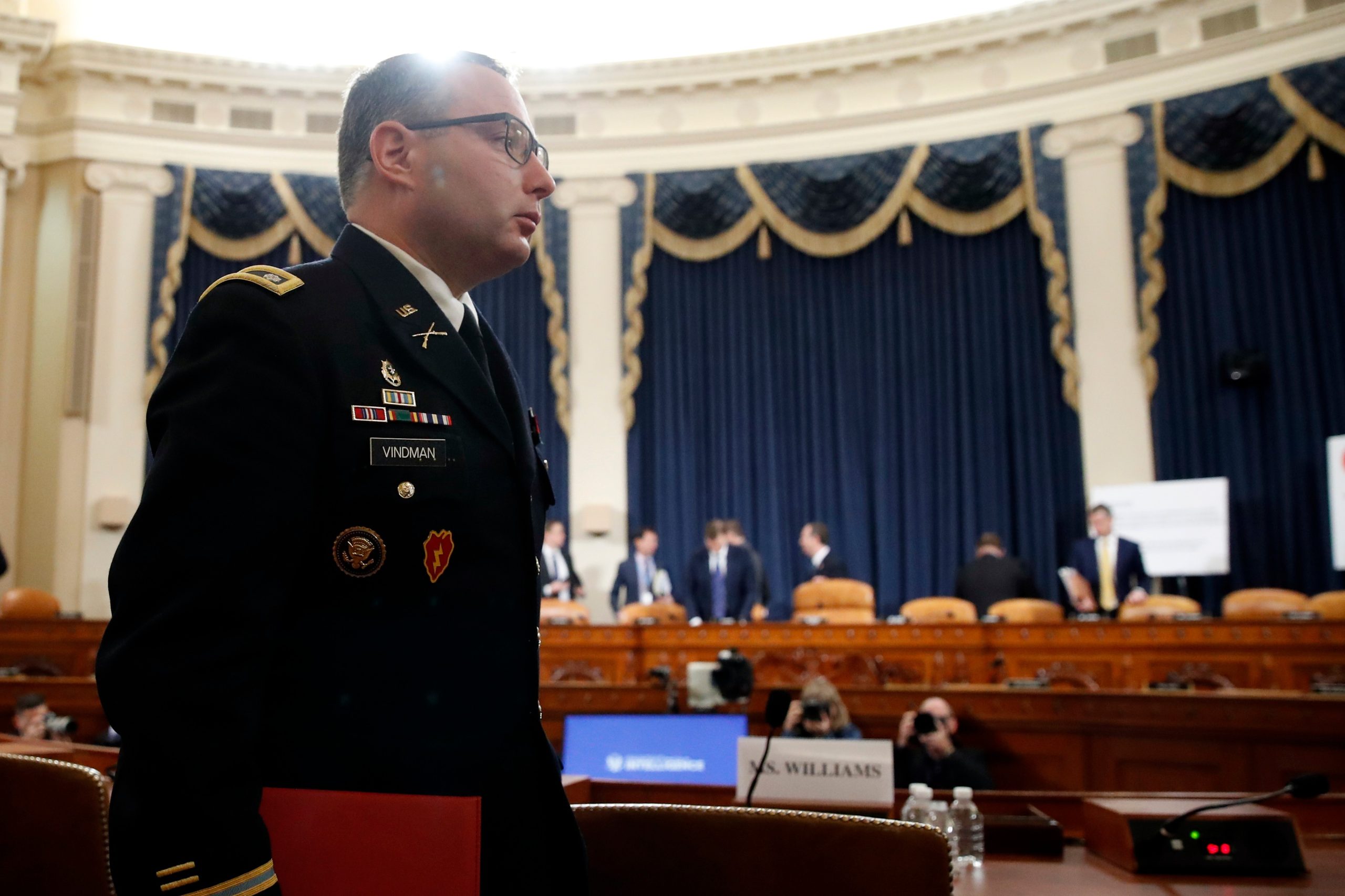 FILE - National Security Council aide Lt. Col. Alexander Vindman departs after testifying before the House Intelligence Committee on Capitol Hill in Washington, Nov. 19, 2019, during a public impeachment hearing of President Donald Trump's efforts to tie U.S. aid for Ukraine to investigations of his political opponents. (AP Photo/Alex Brandon, File)