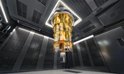 A gold-plated superconducting quantum processor suspended in a dilution refrigerator cooling system