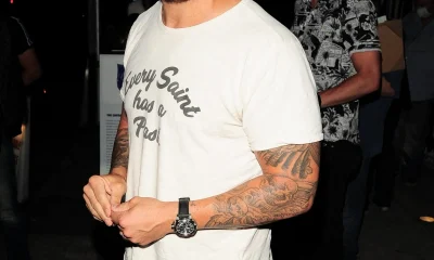 Jax Taylor smiling for a picture at a popular eatery in California.