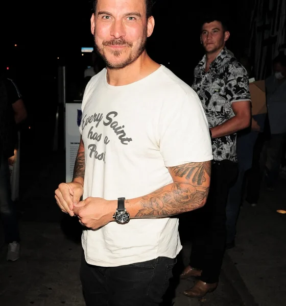 Jax Taylor smiling for a picture at a popular eatery in California.