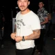 Jax Taylor smiling for a picture at a popular eatery in California.