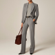 woman wears gray suit in four-season stretch
