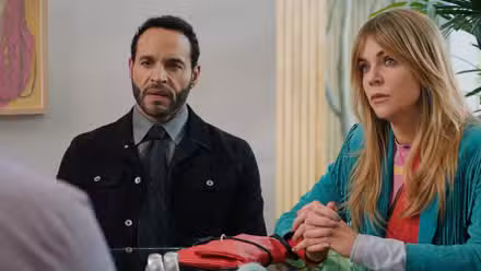 Karadec and Morgan sitting at a table together during an investigation in High Potential