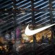 People visit the Nike store at 5th Avenue during the holiday season in New York