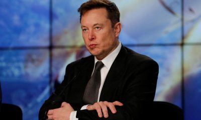 SpaceX founder and chief engineer Elon Musk reacts at a post-launch news conference to discuss the  SpaceX Crew Dragon astronaut capsule in-flight abort test at the Kennedy Space Center