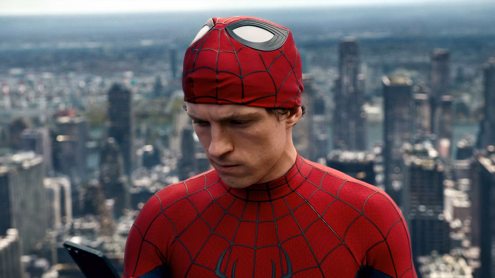 Peter Parker with half his mask off in Spider-Man: Brand New Day