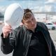 Tesla CEO Elon Musk tips his hard hat