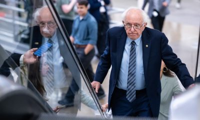 Sen. Bernie Sanders (I-Vt.) ascends on an escalator on his way to a vote at the U.S. Capitol in Washington, on July 30.