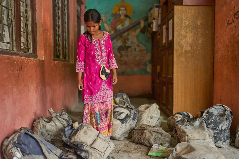 Children at a Nepal school escape floods thanks to their lunch break and alert teachers