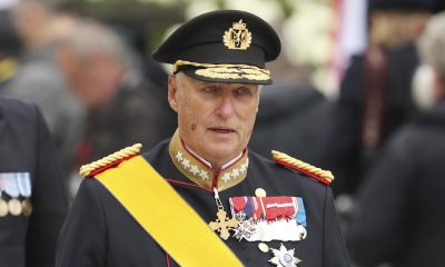 King Harald V's coffin at royal chapel as Queen Mette-Marit joins procession