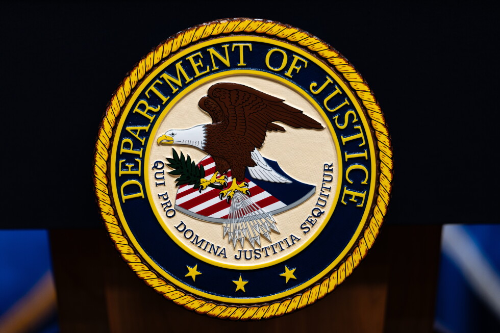 Fired federal prosecutor sues Justice Department