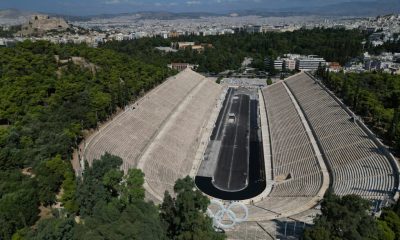Under the dirt, a gleaming Olympic icon: Greece's marble stadium gets a deep clean