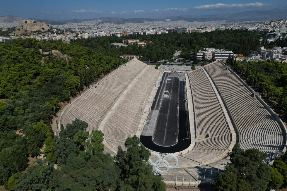 Under the dirt, a gleaming Olympic icon: Greece's marble stadium gets a deep clean