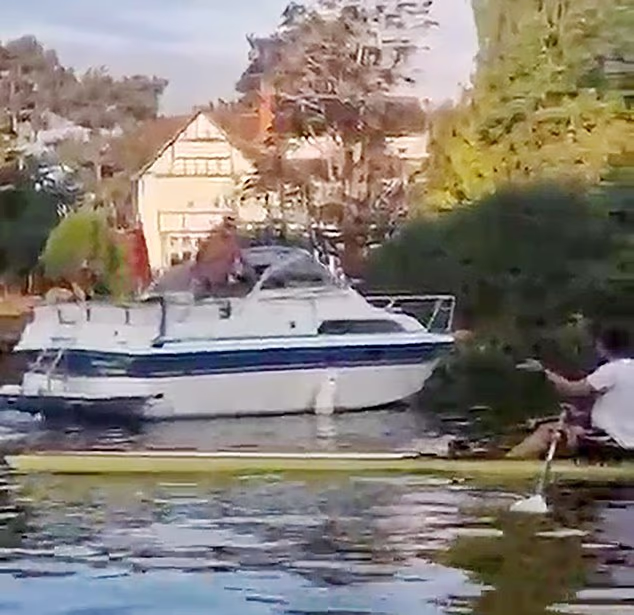 The speed boat's skipper starts shouting at Jack Beaumont, who is trying to calm him down