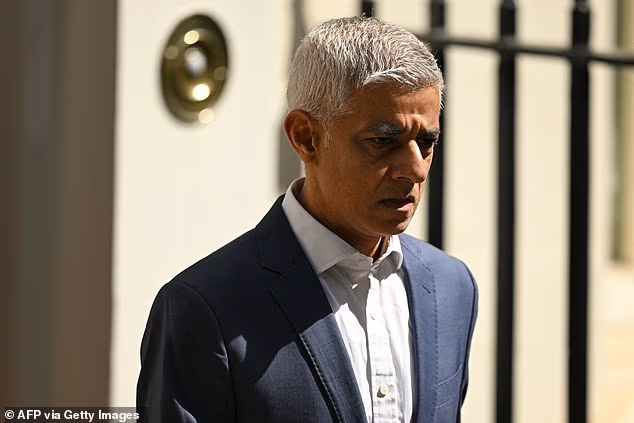 Lord Sadiq Khan, pictured at Downing Street in July, has been fined for failing to pay tax on a Nissan Micra which he claims he doesn't own