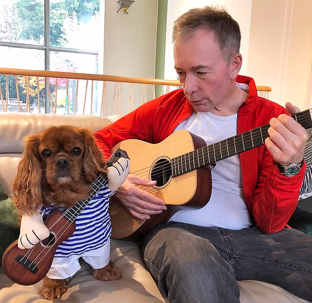 'Nobody will ever love you like a dog. Nobody will ever be as consistently happy to see you as a dog. Nobody will ever make you laugh like a dog. Nobody will ever make you so glad to be alive', writes Tony Parson, seen with Stan dressed up