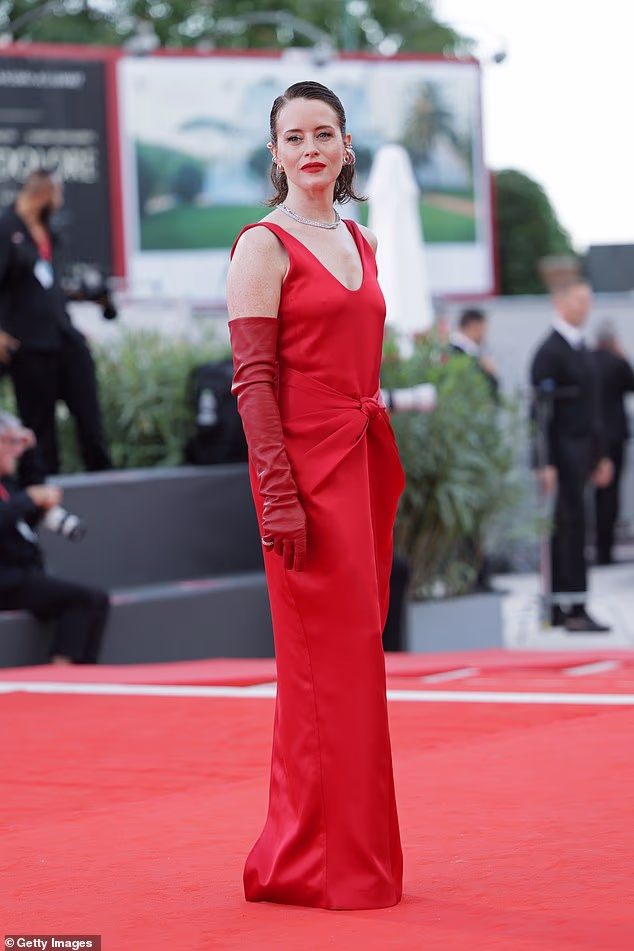 The Crown's Clare Foy, 42, was a world away from the Queen's tweeds as she led the stars on the red carpet at the opening night of Venice Film Festival tonight
