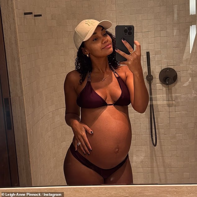 Pregnant Leigh-Anne Pinnock slipped into a bikini this week as she neared her due date and told her followers that her hormones were 'all over the place'