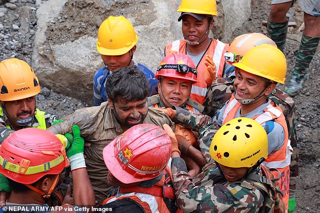 Two men rescued from Nepal tunnel nine days after flood as more voices heard inside hydropower plant