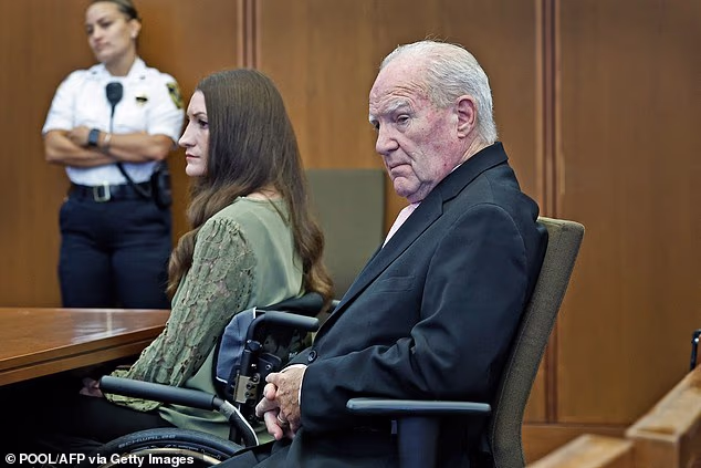 Clancy is pictured with her attorney Kevin Reddington on Friday morning. He was staunchly opposed to Judge William Sullivan's decision to declare a mistria
