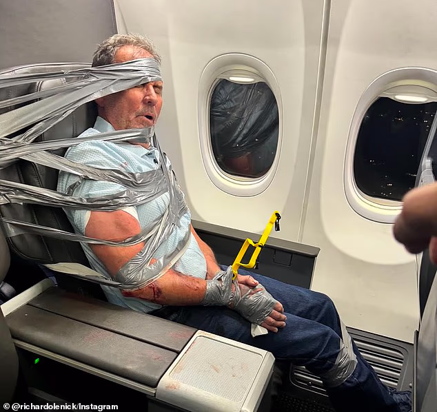 Layne Arthur Lundeen, 67, had to be duct-taped by fellow passengers on an American Airlines flight from Dallas, Texas, to Newark, New Jersey, on Thursday night after allegedly going on a racist and homophobic rant