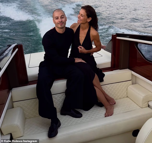 Katie Holmes, 47, slipped into a tiny bikini as she enjoyed a romantic boat ride with boytoy Jason Bard Yarmosky, 39, during a lavish Lake Como getaway