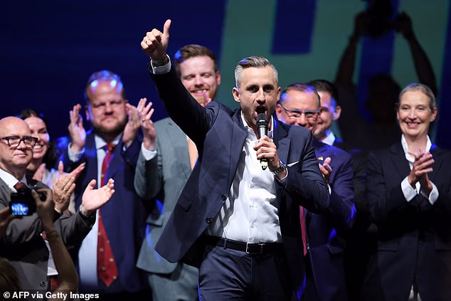 Ulrich Siegmund, hard-right Alternative for Germany (AfD)'s main candidate in the Saxony-Anhalt state election, gestures as he addresses supporters at the AfD's election party following Saxony-Anhalt's state elections in Magdeburg, eastern Germany on September 6