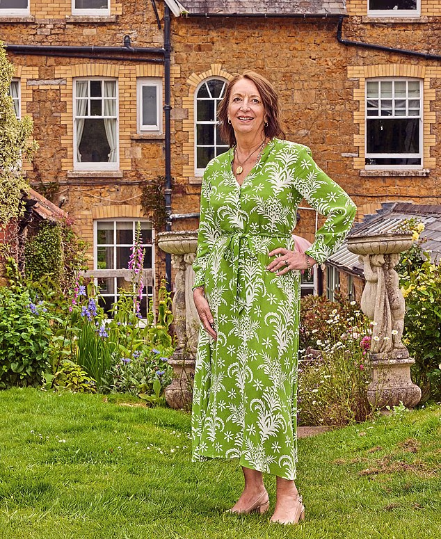 Melanie in her flower-filled Somerset garden
