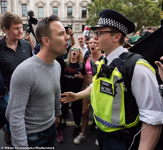 Daniel Thomas (pictured, left, in 2019), the founder of Patriot Platform, was the man behind the protest which saw balaclava-clad men take to the streets of Dover this weekend