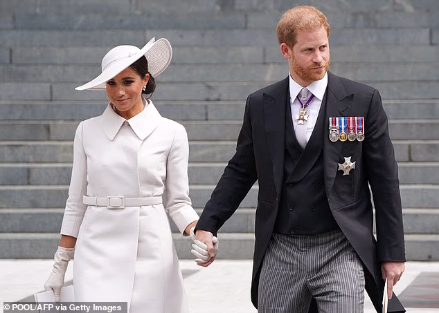 Prince Harry and Meghan Markle, pictured in 2022, yesterday hit out at the King's decision to label them 'private citizens'