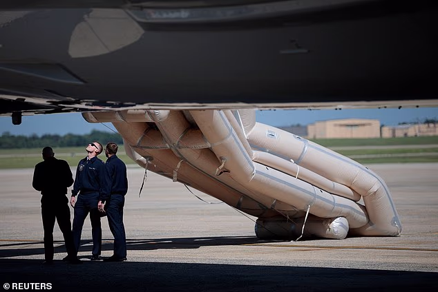 The emergency slide of Air Force One is deployed ahead of U.S. President Donald Trump's trip to the Republican National Midterm Convention, at Joint Base Andrews, Maryland, U.S., September 9