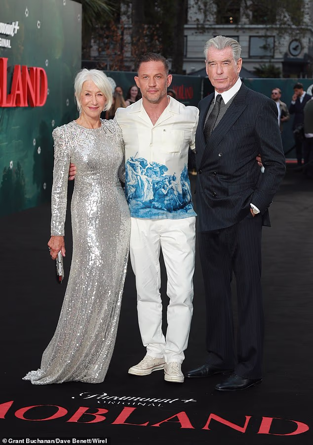 Dame Helen Mirren, 81, sparkled as she cosied up to a very casual Tom Hardy and Pierce Brosnan at the MobLand season two premiere in London on Thursday