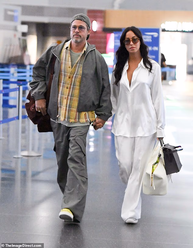 Brad Pitt, 62, kept girlfriend Ines de Ramon, 33, close after his children's public estrangements from him and ex-wife Angelina Jolie's recent boastful statements about her relationship with their kids