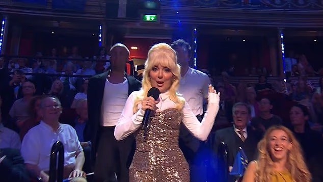 Sheridan Smith opened the segment by belting out Parton¿s feminist anthem 9 to 5 in a gold-sequinned jumpsuit worthy of the Queen of Country herself