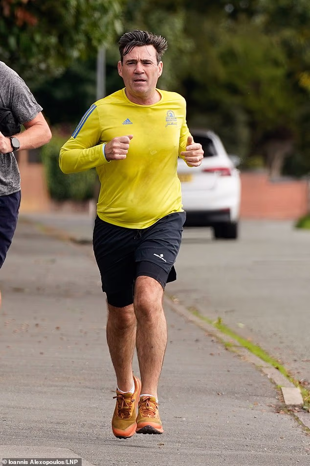 Pictured: Prime Minister Andy Burnham running in Warrington on September 11, 2026
