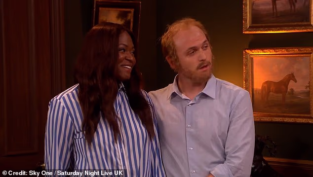 Harry and Meghan's controversial return to the UK has been ruthlessly mocked during a sketch on Saturday Night Live UK (comedians Ayoade Bamgboye and Jack Shep are pictured)
