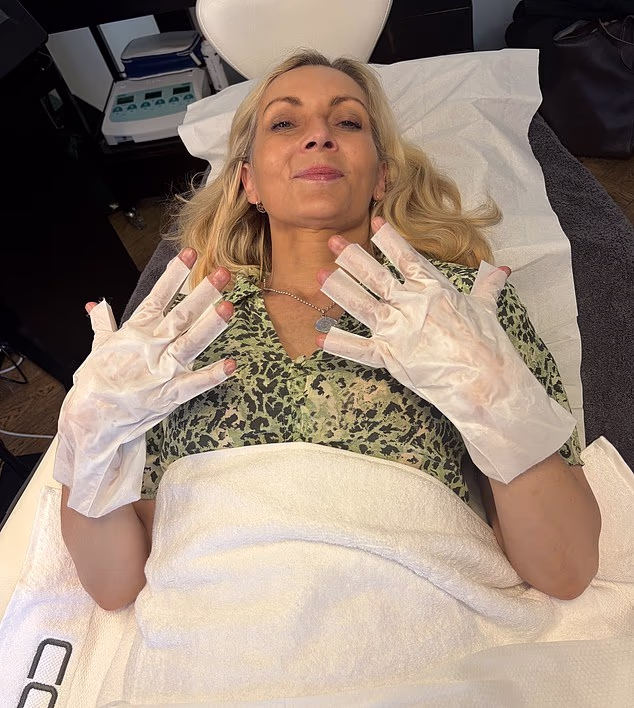 Alice Smellie shows off gloves containing a blend of hyaluronic acid and nourishing Vitamin C