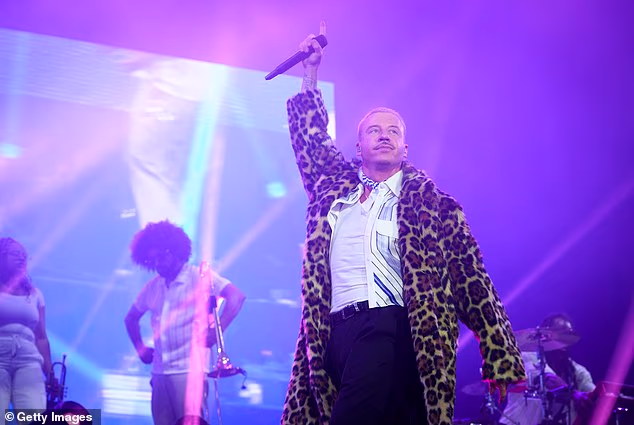 Macklemore, 43, announced on Wednesday that he would be donating $1 million, which he earned from Sheeran's tour, to Palestinian aid groups. Above, in Paris in July 2025