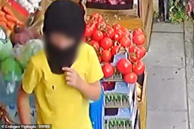 CCTV footage shows the moment two young children wearing balaclavas steal fruit from a corner shop in in Bournemouth, Dorset